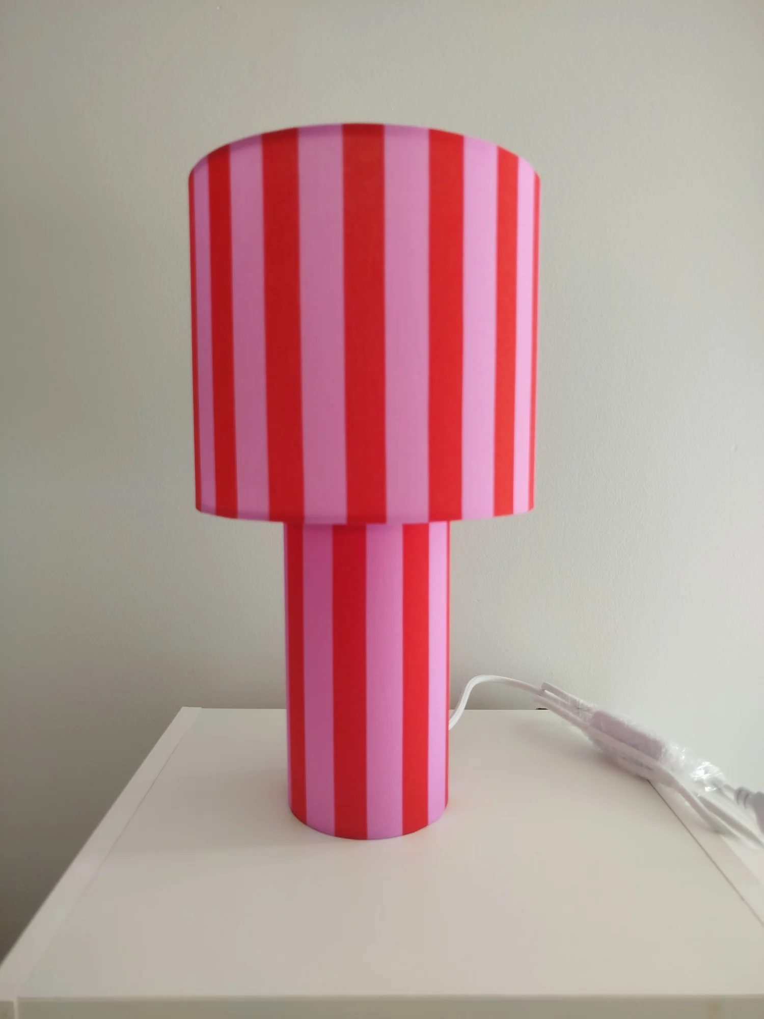 Red and pink striped lamp