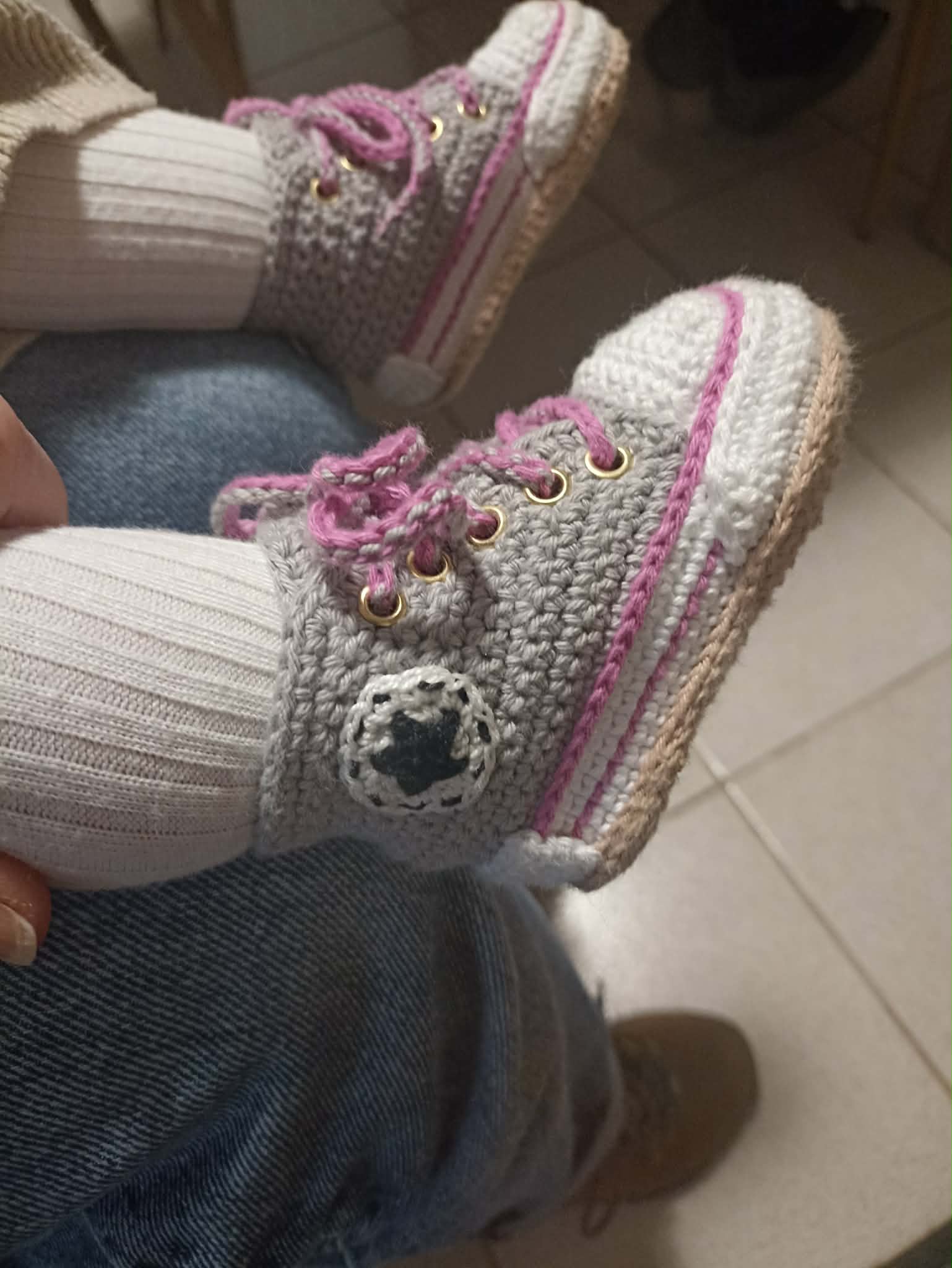 Baby crochet booties, high-cut, with pink laces and a beige sole. (2)